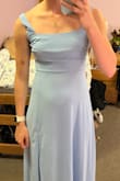 This dress runs large. I am not even close to a size xs but the small was very large in the chest for me - loose on the boobs and below the boobs so it made the dress look unflattering in that area and in general. straps were also too large. shown in second picture. color was very pretty, but will be returning because of the bad fit. If ordering, definitely size down especially if your boobs are on the smaller side! - Meredith A.