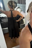 This is probably one of the most comfortable dresses I've ever bought! The material was flowy and light loved the halter long ties and drapey front. There was nothing i did not like about this dress - GINA Q.