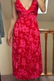 The dress is absolutely gorgeous. Vibrant colours. I'm 156 cm and this is large for me, but I love it. - Mariela