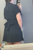 This dress is perfect. I loved the fit of this dress and receive tons of compliments when I wear it. The pockets are great, the bow and twist detail are adorable, but it is on the verge of being a little too short for me. Overall, I think this is a super cute dress that is able to be dressed down with sneakers or up with heels and it is perfect for so many different occasions. - Corie M.
