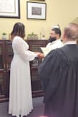 Ordered last minute for a wedding/court ceremony. It fits great; however, I do advise having a low-cut bra or lingerie tape due to it being see-through near the breast area. I loved it and the material. I wore a large and I'm 5'7 weighing 189. I had high heels on as well, so it's pretty long. - Sarah L.