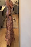 Perfect fit, very dressy, double lined. Nice material with a shiny finish; floor length with room for a high heel. I'm only not giving 5 stars since the color washes me out slightly with a tan - Rachel R.