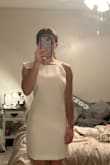 The dress itself isn't very pricey; you get what you buy. I'm a size small so I ordered a size small, and the dress runs loose around my waist, I would have it altered but didn't want to go out of my way to put more money into the dress. The seam on the shoulder is hanging loosely by 2 threads so I have to be extremely careful lol - Hannah K.