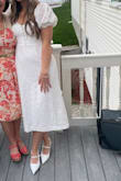 I wore this dress to my engagement party and absolutely loved it! Got so many compliments. True to size. Obsessed with the back of it and and the puffy sleeves. Highly recommend. - Kate M.