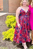 I absolutely loved this dress!! It is gorgeous and was the perfect one for my graduation. That being said, I do have a couple things for you to be wary of, 1. The dress fits snug. I am typically a true XL and it was a bit tight around the waist. 2. The v neck is DEEP! If you have a bigger bust, this might not be the best. I used a lot of tape to keep everything where it should be. 3. The straps. They would not stay tightened! This was probably the most annoying, especially since the straps needed to be tight due the deep v. Even with those few things, I love this dress. I received so many compliments and felt amazing in it! - Lilly M.