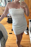 I ordered this at the last minute and decided to keep it for my bachelorette. I love the feather trim on the neckline and glitz without being over the top. Can't wait to wear it out! - Ellie R.