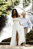 I bought this dress for my ceremony and it was perfect for my waterfall wedding. The fit was true to size. It wasn' see through at all, and hung perfectly off the shoulder! - Aleshia T.