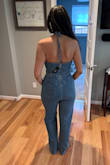 Soft, flattering denim that hugs in all the right places. I'm a small on top and medium on bottom and the medium fit like a glove so I'd suggest sizing up if you're between sizes. I love that it has a belt to outline your waist and pockets in the back. Now this is probably a unique issue to me but I can tell someone tried this on and stretched out the top so I will try to swap mine with a new one. Don't think twice - buy it! Will never go out of style! - Marline K.
