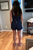 It's a beautiful, thin, high waisted short that has pleats in the right places to cover a lower stomach pouch, but unfortunately it didn't look right on me because I am too wide on the bottom. The whole look would probably look great on most figures just not super curvy ones like myself. I would say if you want to give it a try size up for the bottom and your regular size for the top. - Marline K.
