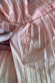 The colors are beautiful but the fit is just so off, as hard as I tried, I could not get the top to lay correctly. As others mentioned, there is a lot of extra fabric at the left side of the waist. The right side strap pulls that side up and will just not lay right. The center seam of the bottoms is also stitched weirdly and gives a very odd bunching right at the crotch area. - Jennifer M.