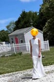 I wore this dress for our intimate (closest family) ceremony and couldn't have asked for anything more! I received so many compliments on the this dress it was incredible. I chose not to get it altered although I probably could've used a small hem and an inch or so taken in at the waist, but i have thicker hips and no waist. I am 5'5 and wore 4-5 inch heels, although I do have a very long torso so I feel like that helped the fit. It made me feel amazingly confident, I was worried I would feel exposed but I didn't feel that way at all! It was elegant and especially at this price point It was perfect. The material was stretchy and comfortable on a 70° May afternoon. - Jillian T.