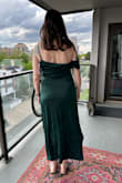 I bought this for an art gallery wedding and really liked it. Originally purchased in the magenta color, but that fabric looked cheaper than I wanted. The green looks sophisticated. It also does not lean holiday, which I was somewhat concerned about. Ultimately a flattering dress. In my case I'd want shapewear to smooth things out, but otherwise great. - Brittany R.