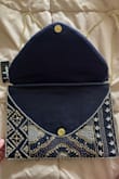 This is beautiful! You can wear it as a purse with the straps, or tuck them inside to make a clutch. The beads are stunning. There's a little pouch inside to put cards/your license/room key. There is also room for your phone and car keys! The quality is great too. Very classy! - Kayla S.