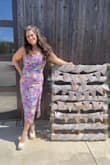 This dress made me sooo happy! My guests for my bridal shower were just as stunned by how gorgeously fun and glamorous this dress is! It fit like a glove while having enough structure to avoid highlighting my trouble areas. Happily, it was not at all scratchy on my arms which I was worried about. I love everything about this dress! - Margaret L.