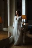 My husband and I recently had our 10 year vow renewal in Scotland. I ordered six dresses and this one was among the two I kept. It fit like a glove! It was elegant, lightweight, and was perfect for our fairytale venue. You can't beat the quality for the price. If you are on the fence about purchasing, do not hesitate. This one is stunning! I typically wear a size 4 and other than length, this dress fit perfectly. I elected not to have it hemmed and it was fine with the heels I wore. Buy the dress, buy the dress! You won't regret it. - Kailee M.