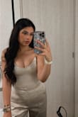 Wore this top for my birthday dinner. It runs a little small, but I wouldn't size up. Super cute top. Can be dressed up or down. - Cynthia H.