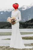 This dress was perfect for my spring wedding in the mountains. I absolutely love the clean lines in the front and the cutout in the back. It's subtle and stunning at the same time. - Sarah B.