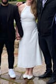 I was looking for a wedding dress that would work for an outdoor May wedding and this was perfect! It was elegant without being too fancy/ frilly for an intimate outdoor ceremony. I ended up using spanx to help me feel more comfortable with how tight the dress is around my stomach. - Brenda T.
