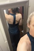 This is my first time buying jumpsuits. It looks very nice but I'm not sure I'm sold on the jumpsuit style (my own personal preference, not the jumpsuit's fault). I ordered some belts to see if I like the look better if it's broken up a little more. I love the open back of this one. The cowl neck is a little odd because of how small it is. I bought this and another one to potentially wear to a wedding and haven't decided which to wear yet. - Hannah A.
