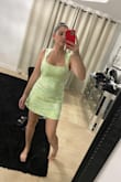 Loved this little cocktail number! Gave me great cleavage and super fun! My husband loved it when he saw it, went with the green to fit in with the jungle vibes at the Xcaret hotel in Tulum, Mexico. I would absolutely recommend this dress. Was a little tight in the waist but I just had my third child and it made me feel cute and girly! - Tiana D.