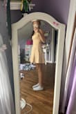 This dress is so pretty and looks just like the picture. I love the material and pattern. Not too short, appropriate for school and family events. - Ella T.