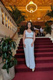 I got the set in white; top in small and pants in medium. This is so absolutely beautiful and soft. I felt so great wearing it. I bought it for my job in Miami. But wore it out to dinner in DC in the pictures. Looks great with a blazer for work but so sexy for a girls' night dinner outfit. Just obsessed. The pants are so long and definitely need heels, which I love. - Amalia F.