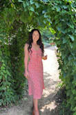 Loved this dress. You get the modesty with the length but still sexy with the way it hugs your body. The front ties so you can loosen or tighten. The fit was just right. The material isn't stretchy but was not tight or restrictive either. - Sierra H.