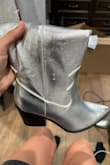 The silver is coming off the boats. May I have the same exact pair sent out please?

Thank you Rachel - Rachel C.