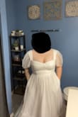 I tried on about 10-15 different dresses from Amazon and Lulus for my bridal shower. After over a month of trying on/returning, I finally found my dress! THANK GOD! A lot of my weight is in my belly and I want to do anything that I can to hide that. This dress is not only super cute, comfortable, and good material, but most importantly, [wearing it] makes me feel good about myself. I do have to use my Boomba boob inserts in the chest because my bra & bra straps show, but the Boomba I have is a push-up and really gets the girls up at a comfortable spot. The bottom part of the dress is a tiny bit see-through. I originally tried it on with black Spanx and could see through it slightly. I have a photo with no inserts and black Spanx on and [another] photo without Spanx and with my Boomba inserts. Oh, and there [are] pockets!!! So cute. Love it - Jadie O.