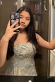 I think this material [makes it] really easy for the dress to [fall down]. [Good] color but should be tighter or smaller in the waist. Pretty good overall! - Hong N.