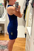 This dress is really nice. The material is solid, it's not cheap or see-through by any means. I read reviews complaining about the neck line choking you but it didn't seem to bother me at all. I'm always stuck between sizes (small and medium). I got a medium and although it fits me great, I think I could have gotten away with the small. There is a little extra fabric in the mid section on me that doesn't hug my body quite right. Had I gotten the small it probably would have fit perfectly and really accentuated the hour glass shape, but I'm going to keep the medium because it still fits really nicely on me and I just don't feel like returning it over something so minor. The length is perfect too imo. Very appropriate for a wedding, not too short and not sitting at my knees where it'll make me look stumpy. Hope this helps! - Lily O.