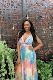 I LOVED this dress and got many compliments. My only complaint is that it was extremely long. Tooo long! Even with heels, I tripped on it many times and my heels actually got caught in the fabric and ripped a small hole. It's a beautiful dress, but needs to be hemmed. - Erin M.