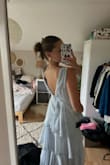 la robe est super et de bonne qualité ! elle tombe sur les pieds ce qui est rare quand on fait 1 mètre 75. Elle est juste un peu large pour ma part au niveau de la taille.
Translation:
The dress is great and good quality! It falls on the feet which is rare when you're 1.75 meters tall. It's just a little wide for me at the waist. - Alice L.