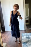 The dress was everything I had hoped it would be! The color, fabric, and fit were perfect and I looked great in it. I was so happy! The only issue was the zipper. It was very difficult to zip up or down (needed two people to help) because of the layers of fabric involved. - Sarah G.