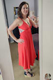 Love this dress! Great for a night out, happy hour, or vacation. The pockets are a great addition. The color is more of an orange/red than a true red. The tie-back is nice to adjust sizing, and the waist is comfortable. I'm 5'9.5", 155 lbs, 36B, 30-31" waist, 40" hip and athletic. - Christina M.