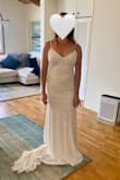 This dress was really nice and very light. It just wasn't the one for me. - April N.