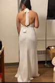 I was hoping to love this dress for my wedding, but because of its thin material, it arrived really crumpled. I'm not sure if ironing it will even help to straighten it out so I had to return it - Dawn L.
