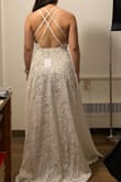 I love the way the fabric moves and the sexy slit, but the waist was a little too low for my long torso. The chest area is too loose for me. Wanted to love this and use it for my wedding because it looked so beautiful on both models from the photos but sadly it didn't fit me as well. - Dawn L.