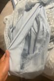 This dress ripped in less than 1 hour of me wearing this at a wedding. ADDITIONALLY, The outside seams of this dress as well as the inside slip of this dress KEPT SHIFTING to the middle. No matter how careful I was, when I took a few steps the dress would shift. The dress CONTINUED to rip due to all the shifting, and obviously I had to sit down for parts of the wedding so it ripped more. It got so bad I had no choice but to wear my husbands tux to cover my body due to the 3 LARGE rips (see photos) For being priced at $60, this dress was poorly made and cheap quality. I remember seeing another review similar to mine with the same colored dress. I didn't listen to her and I deeply regret not doing so. PLEASE DO NOT PURCHASE. I am writing this immediately after returning from the wedding because it was that bad. - Mara C.