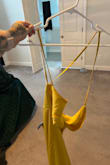 Chief complaint is it only has one string to hold it on the hanger. The other one is missing. I'm traveling to the opposite coast for a wedding and I'm trying to hang it in a garment bag and it keeps sliding off the hanger and pulling all of the strings out. I don't know if it's a mistake or if that's how it's supposed to be but I'm super stoked to spend 2 hours steaming the wrinkles out of in when I get to my hotel. Other than that, the dress is beautiful and the size suggested by lulus based on my measurements is perfect! - Amanda V.
