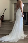 I bought this dress for my wedding, as soon as I opened the box I loved it, but at that moment a lot of the sequins came down. It runs large, I bought xs, my weight is around 114lbs, so I took it for the changes needed bc I really liked it. I think it is overpriced bc all the sequins come down almost touching it. The seamstress said it also has a fabric defect on the v-neck. It is a dress that will work for your special day and looks great but may be overpriced for the quality - Ana A.