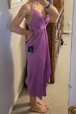 This dress is gorgeous! The color is amazing (I also have it in red!) The small fits perfect. I am 5'9, 137 lbs, and a 34D. The chest area does lay oddly, but that's the intention. Gives you a vintage look. I can't wait to wear this to a rehearsal dinner this summer. - Page D.