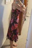 Beautiful midi. Figure flattering. Not much stretch though, so be careful. Sexy, but classy. I plan to wear to an upcoming summer event. - Page D.