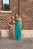 I'm 6', and I was tripping on this in 3-inch heels! For the first time in my literal 36 years on this earth, I had to get a dress shortened! The attached photos show the dress after I got 3+ inches removed (I'm wearing flats at 6' in the photos). Also, the color is really cool and looks different in different lighting, as shown in the photos. Got tons of compliments on this dress! - Kelly F.