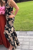 I wore this dress to a lovely June wedding and absolutely loved it! The print and style are beautiful. It was a little loose on me, but I didn't want to alter it so I can wear it again or let my friends borrow it. Highly recommend! - Nora S.
