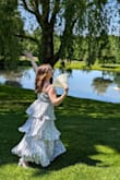 This dress was perfect for a backyard wedding. It fit perfectly and didn't need to be hemmed. It flowed perfectly for pictures too! - Brittany W.