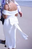 This dress was so beautiful and classy for my wedding. The quality is great. It was the perfect length for a beach ceremony. - Toni G.