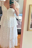 It was cute online but unfortunately, I found that the fabric felt cheap and the tie in the front greatly contributed to that opinion. It felt like something you would find at Walmart and the threads were hanging in multiple areas. Other dresses on here for a lower price have been much better quality. - Devon M.