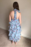 I was scared to order this dress because it had no reviews at the time, but I'm glad I did! I love the open back, the v in the front isn't too low for me, and it's very twirly. Also it wasn't that wrinkled fresh out of the bag, which is a good sign. I would say if you are smaller on top like me, maybe order a size down? I usually wear a medium in dresses, but I ordered both a small and medium in this one, and the small fits perfectly. The only thing I'm a little worried about is the zipper does not pull easily, so I worry it will break. - Jessi C.