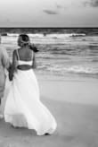 The dress fit perfect. We had a beach wedding and the way it caught in the breeze was absolutely gorgeous. I could not have been any happier. - Kimi P.